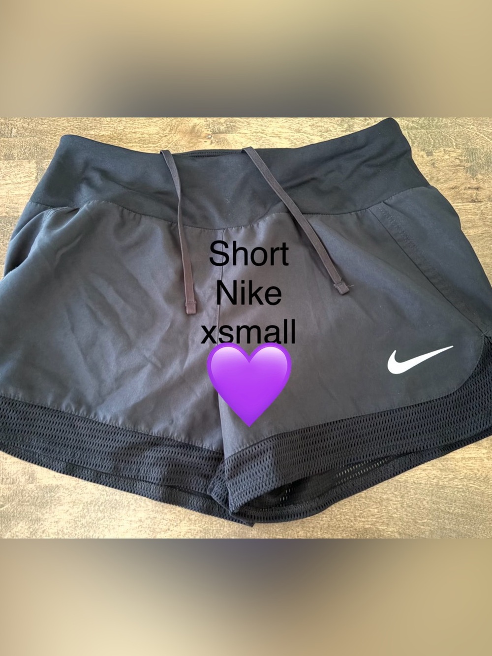 Nike Women’s Black Athletic Shorts with White Swoosh